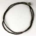 ニッケルアルボ黒ビーズ 厚1mm×Ф3mm 80cm